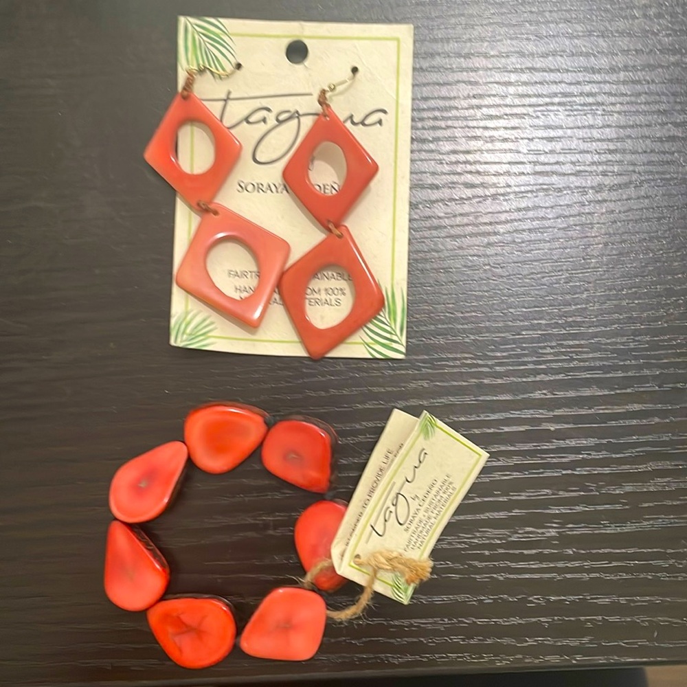 Coral colored earrings and bracelet set made of Tagua. Never worn .